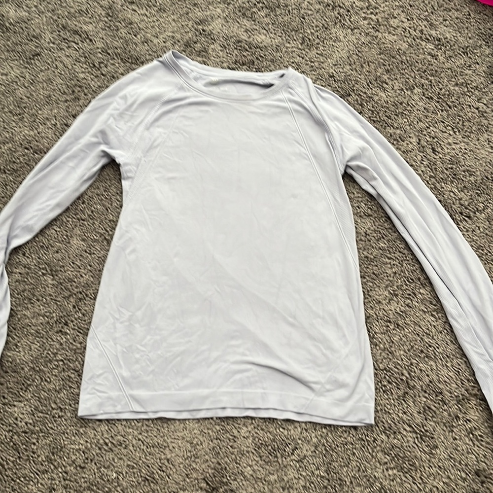 a light lavender breathable workout long sleeve.